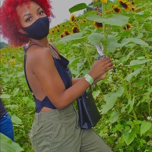 Backless black bodysuit.